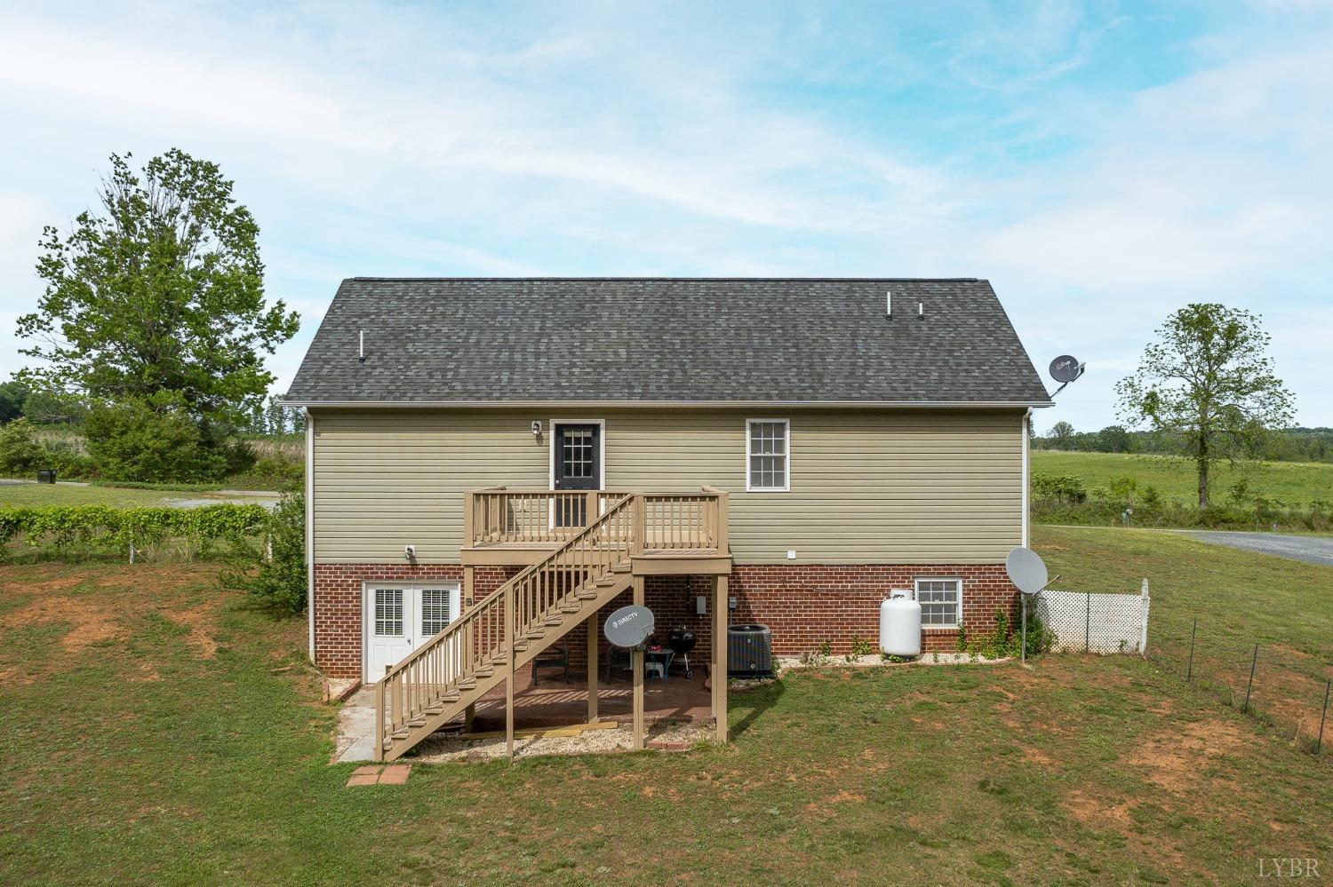 7179 Stage Road Concord, VA 24538 - Photo 46 of 52 a aerial view of a house with swimming pool next to a yard