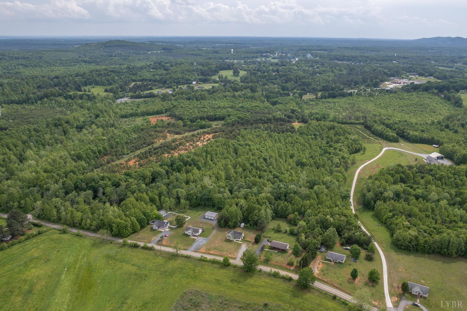7179 Stage Road Concord, VA 24538 - Photo 49 of 52 an aerial view of residential houses with outdoor space and trees