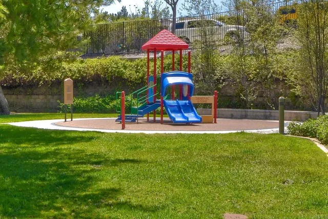 a view of a park with swings