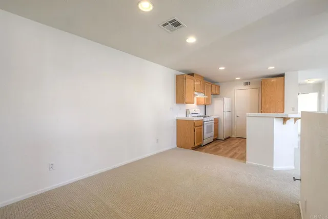 a view of a kitchen with a sink