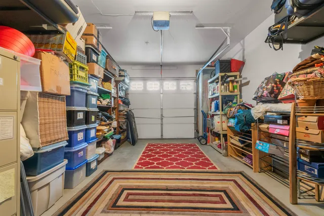 a room with lots of different colored cloths