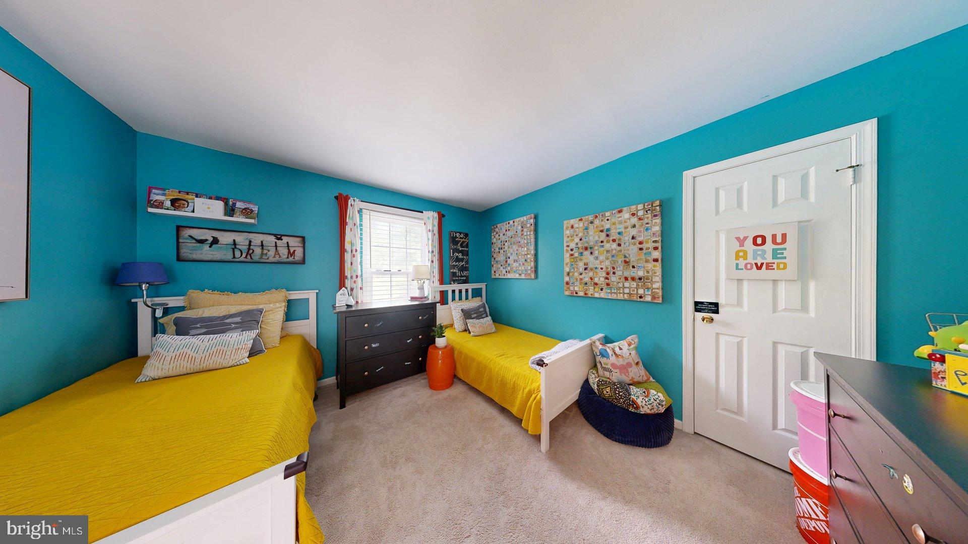 11901 Rustic Farm Court Germantown, MD 20874 - Photo 42 of 134 Vibrant twin bedroom with cheerful decor.