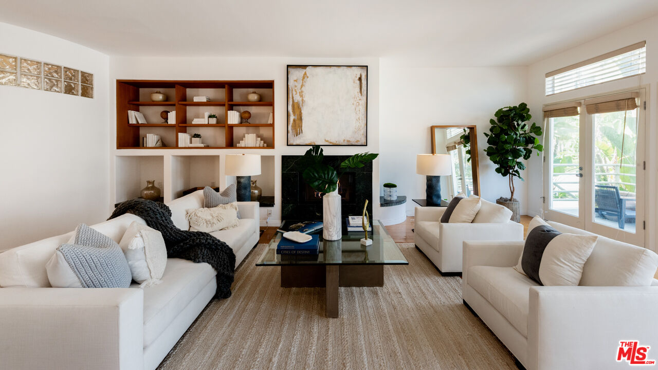 20 Voyage Street Marina del Rey, CA 90292 - Photo 1 of 28 a living room with furniture and a wooden floor