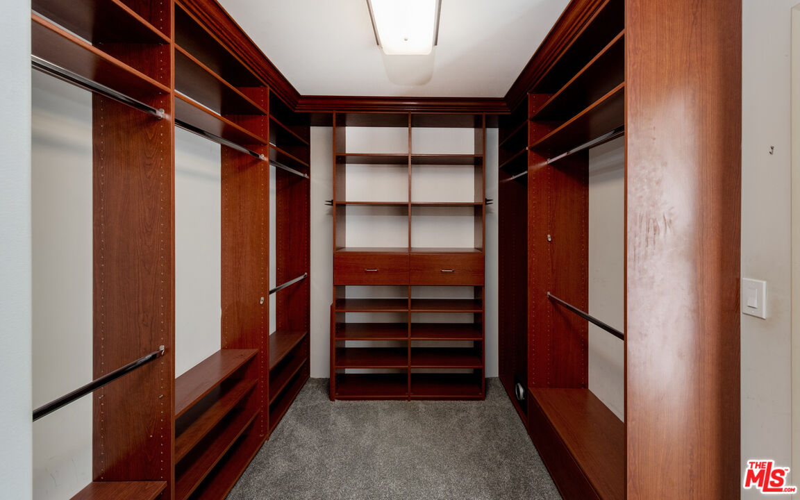 20 Voyage Street Marina del Rey, CA 90292 - Photo 15 of 28 a view of walk in closet with empty racks
