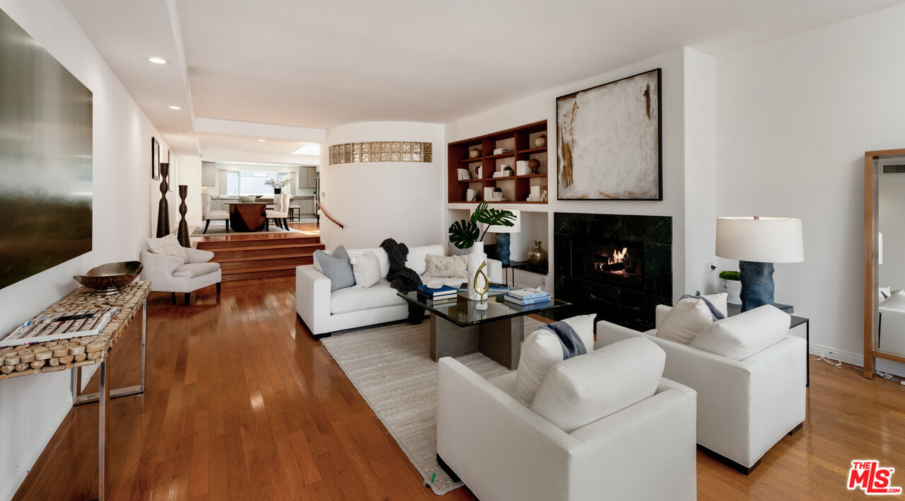 20 Voyage Street Marina del Rey, CA 90292 - Photo 2 of 28 a living room with fireplace furniture and a flat screen tv