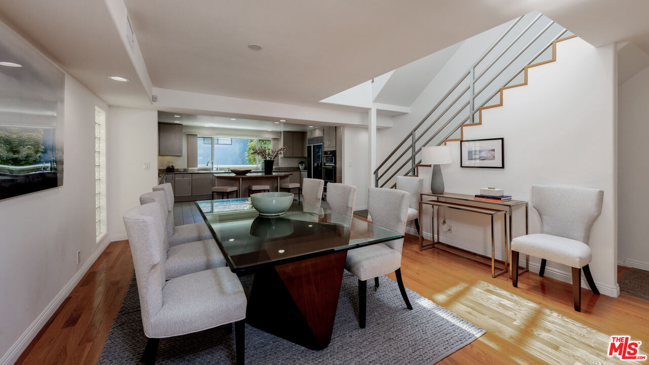 20 Voyage Street Marina del Rey, CA 90292 - Photo 4 of 28 a dining room with furniture and wooden floor