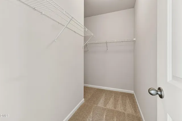 a view of a room with racks on the wall