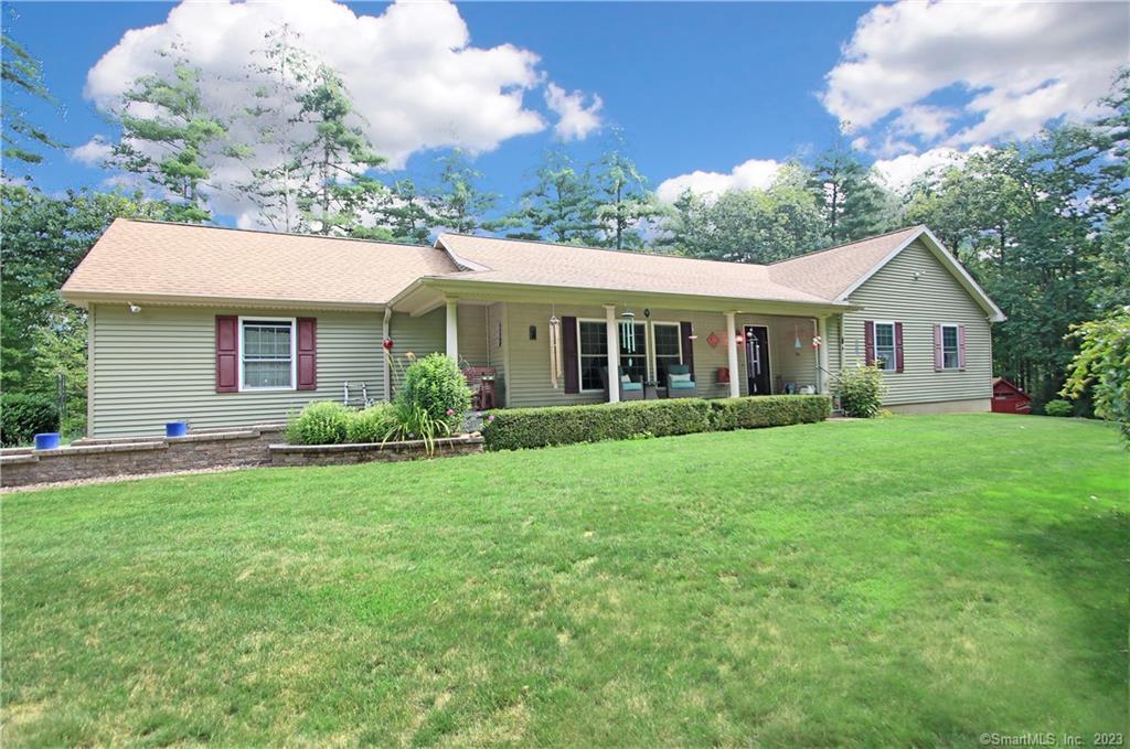 3 Upper Hampden Road Stafford, CT 06076 - Photo 1 of 1 a view of a house with a yard and potted plants