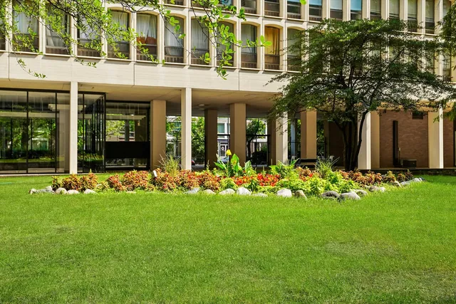 front view of a building with a yard