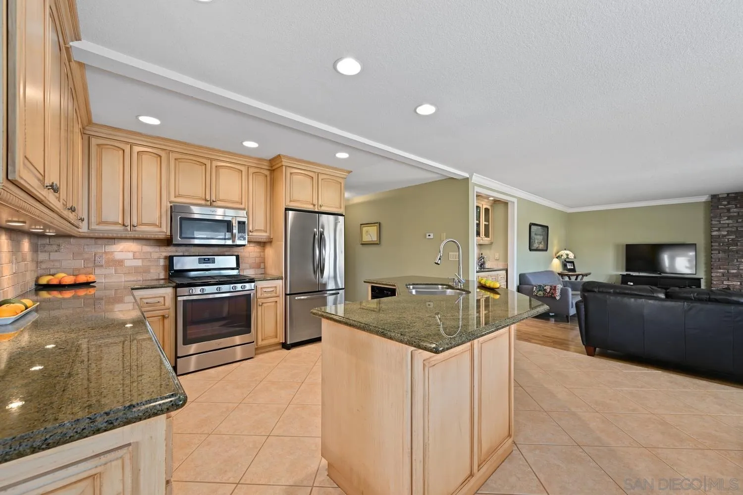 1282 Olive Avenue Fallbrook, CA 92028 - Photo 13 of 55 a kitchen with refrigerator and stove