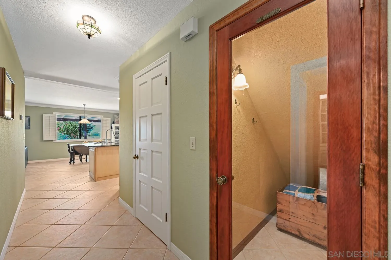 1282 Olive Avenue Fallbrook, CA 92028 - Photo 19 of 55 a view of a hallway with dining area and dining room view