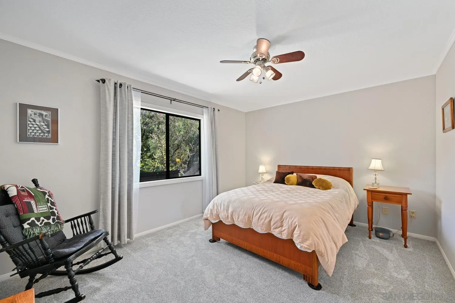 1282 Olive Avenue Fallbrook, CA 92028 - Photo 27 of 55 a bedroom with a bed and a window