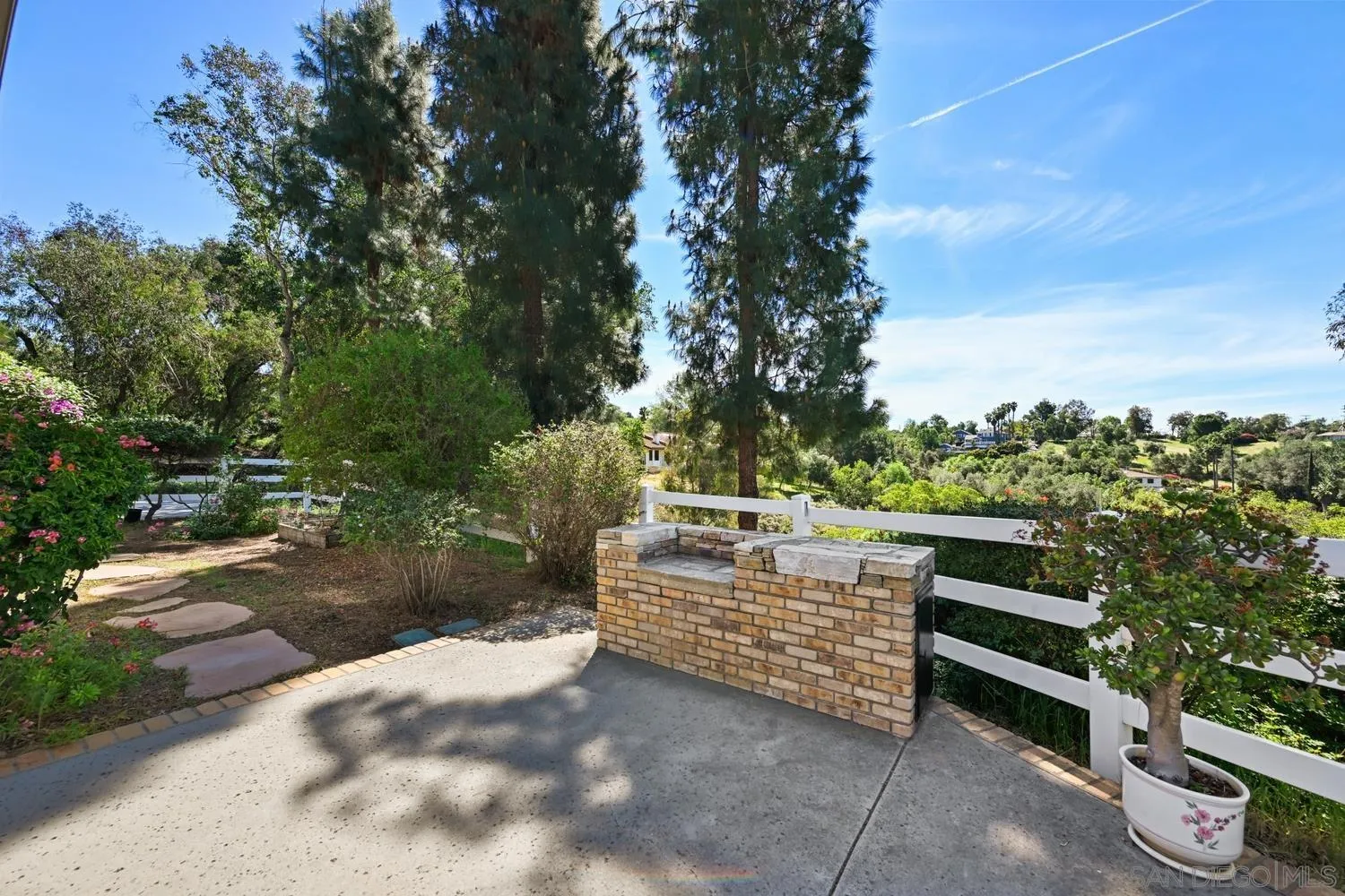 1282 Olive Avenue Fallbrook, CA 92028 - Photo 35 of 55 a view of a yard with plants and trees