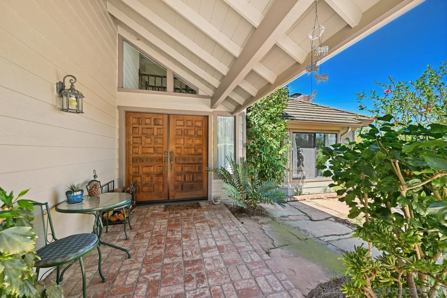 1282 Olive Avenue Fallbrook, CA 92028 - Photo 4 of 55 a view of a backyard with plants and a patio