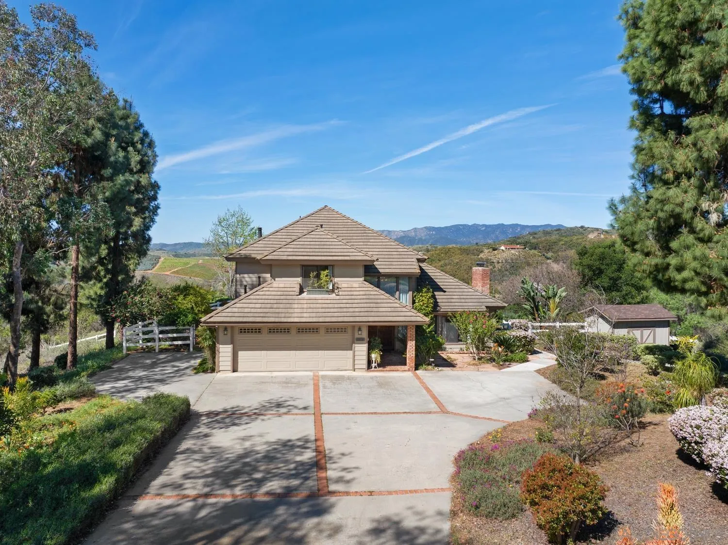 1282 Olive Avenue Fallbrook, CA 92028 - Photo 50 of 55 a front view of a house with a yard