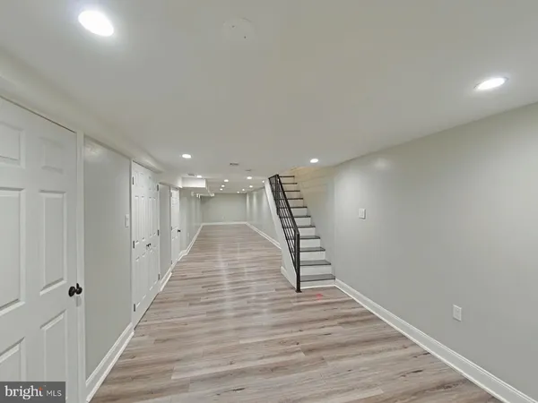 a view of entryway with wooden floor