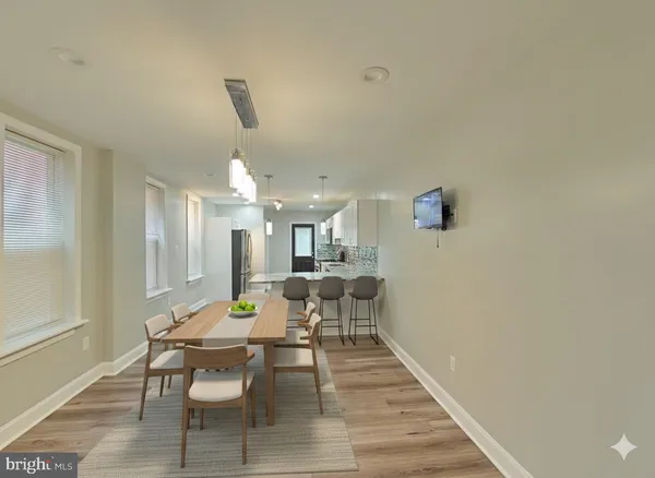 a view of a dining room with furniture