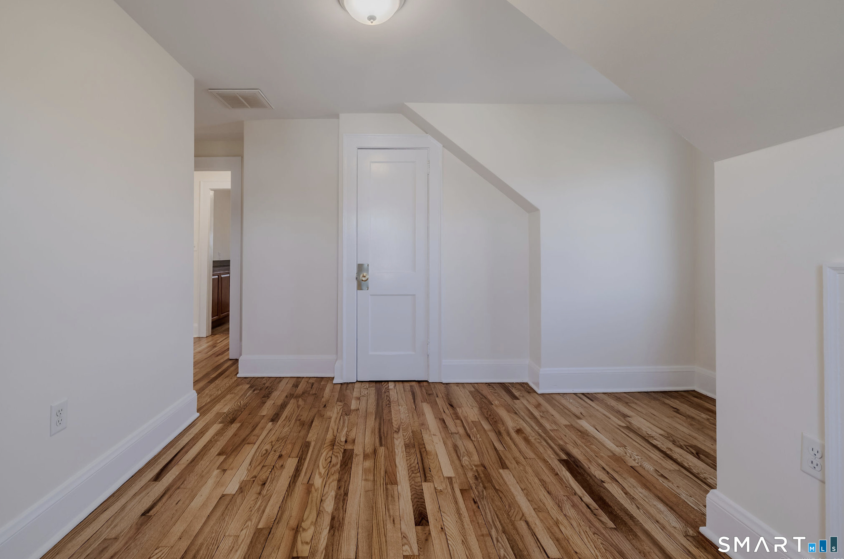 11 Piney Ridge Road Cromwell, CT 06416 - Photo 18 of 19 a view of room with wooden floor