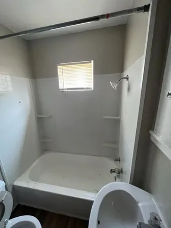 a bathroom with a sink and a toilet