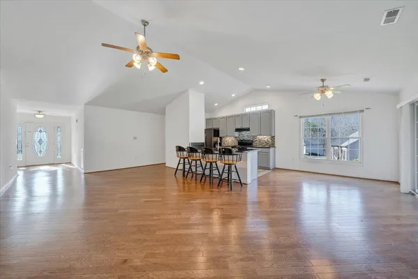 a kitchen with a stove and a sink