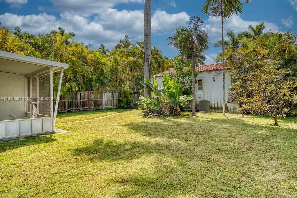 515 West 30th Street Miami Beach, FL 33140 - Photo 26 of 30 a front view of a house with a yard