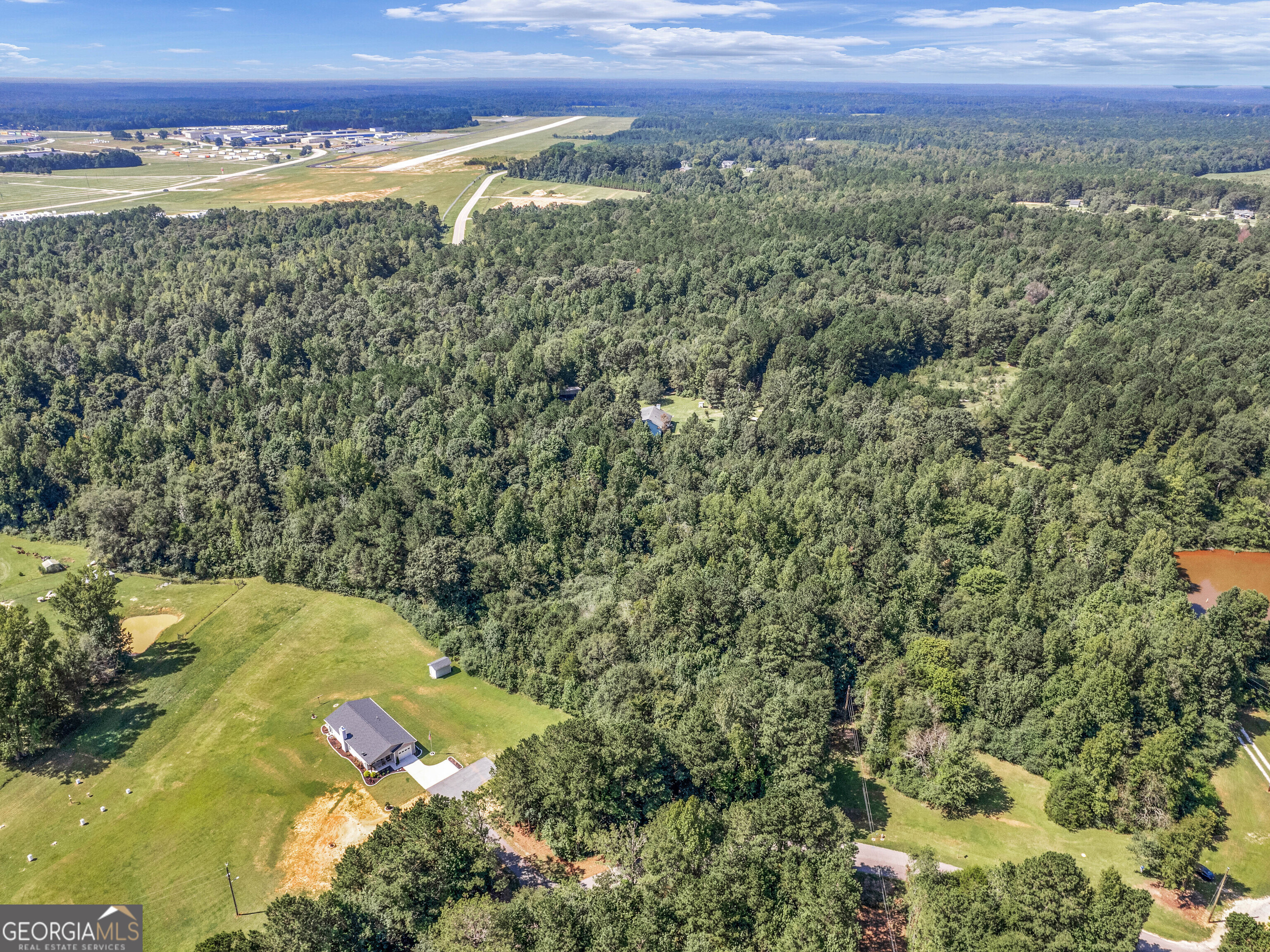 127 Little Road Hampton, GA 30228 - Photo 10 of 13 a view of a field with an ocean view