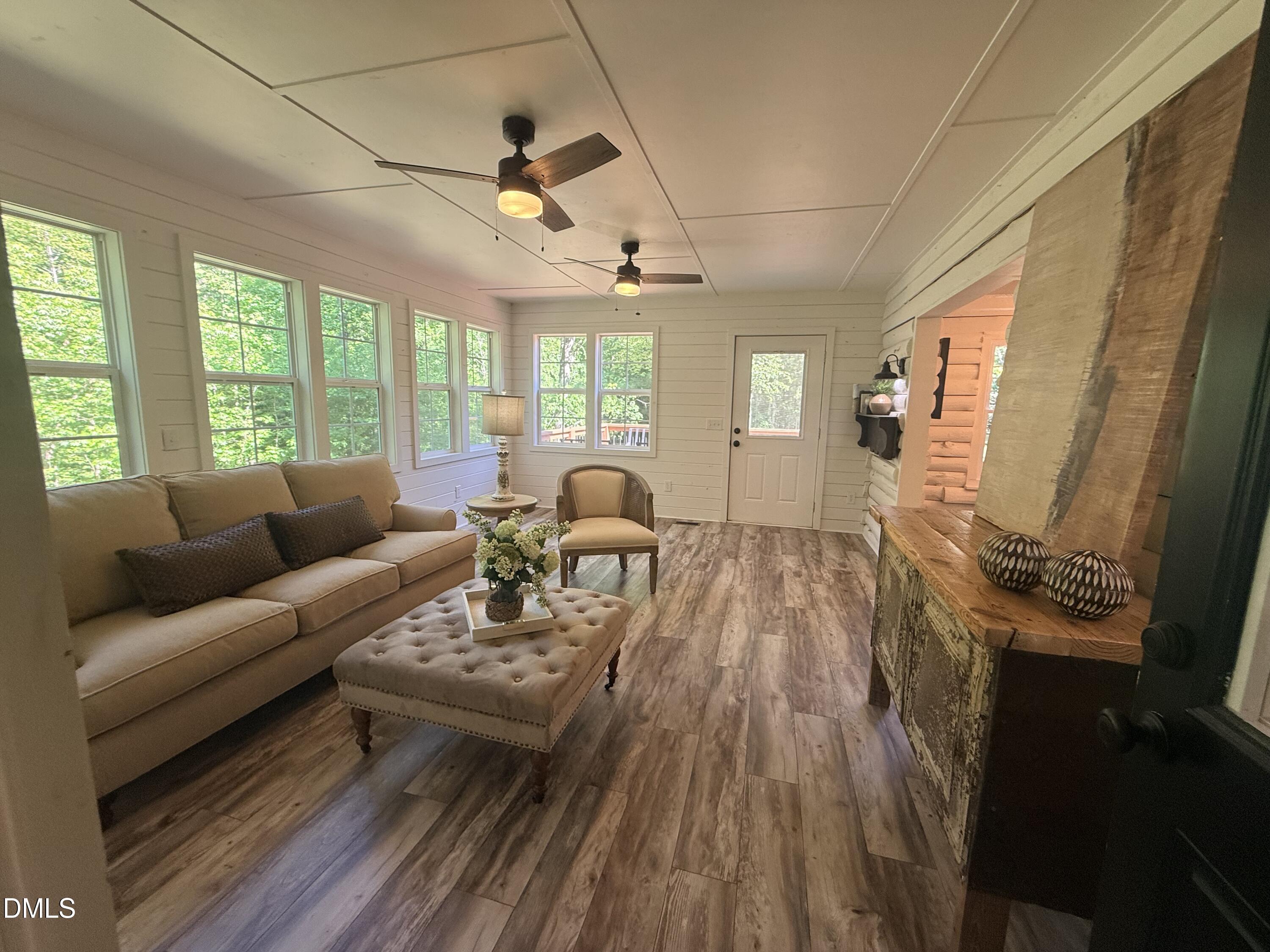 327 Shady Oak Road Roxboro, NC 27574 - Photo 25 of 62 a living room with furniture and a fireplace