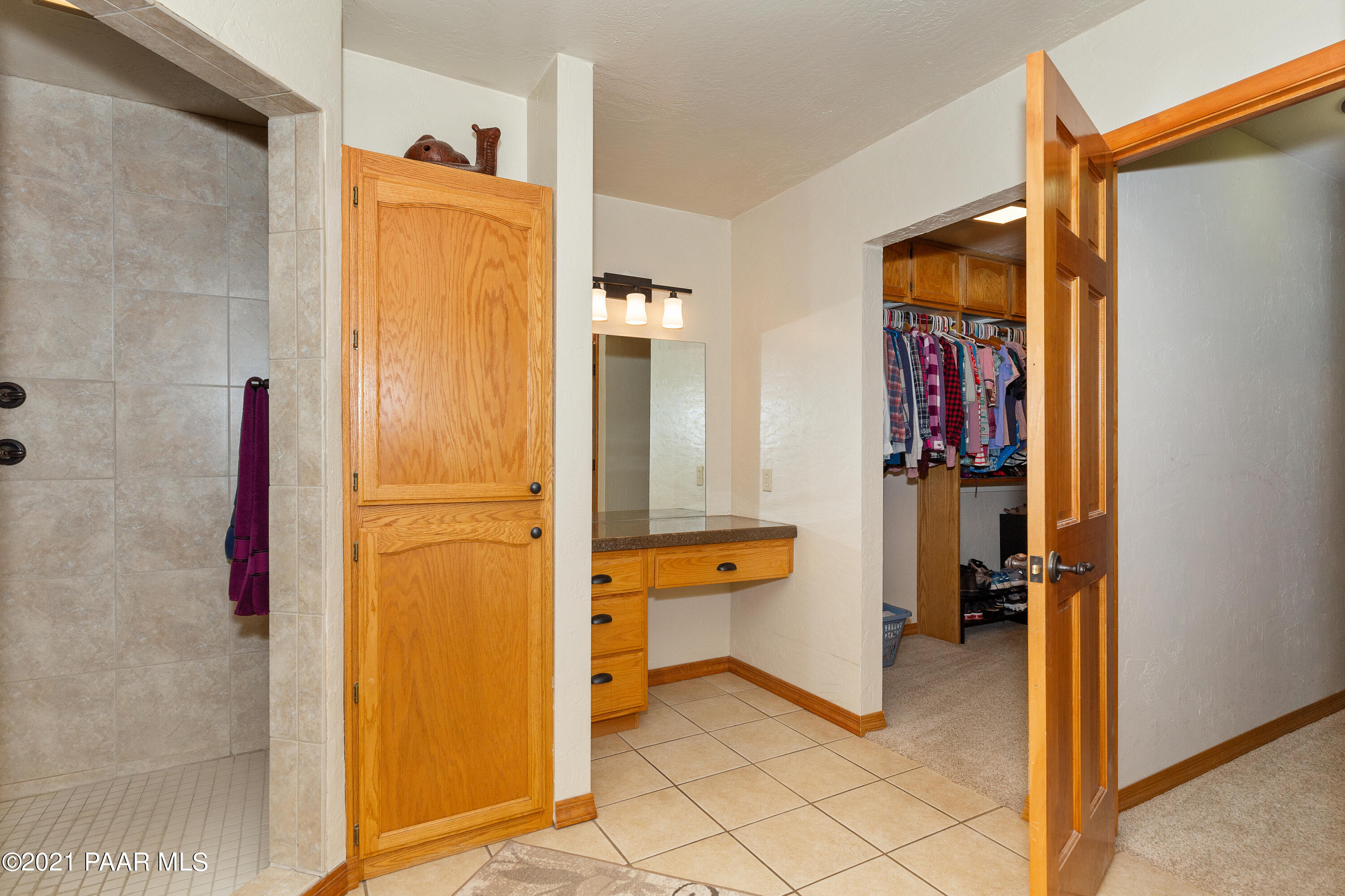 3727 North Reed Road Chino Valley, AZ 86323 - Photo 13 of 45 a view of walk in closet with clothes