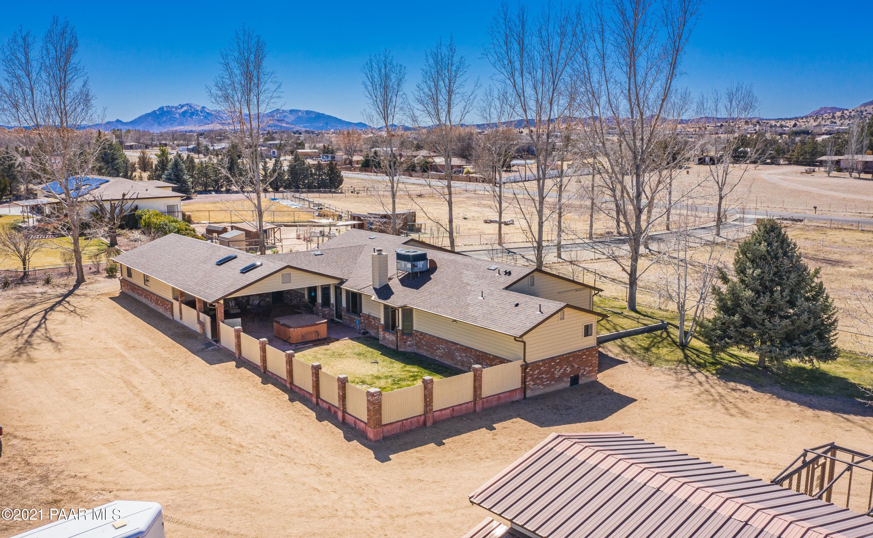3727 North Reed Road Chino Valley, AZ 86323 - Photo 25 of 45 a view of a terrace with a table and chairs
