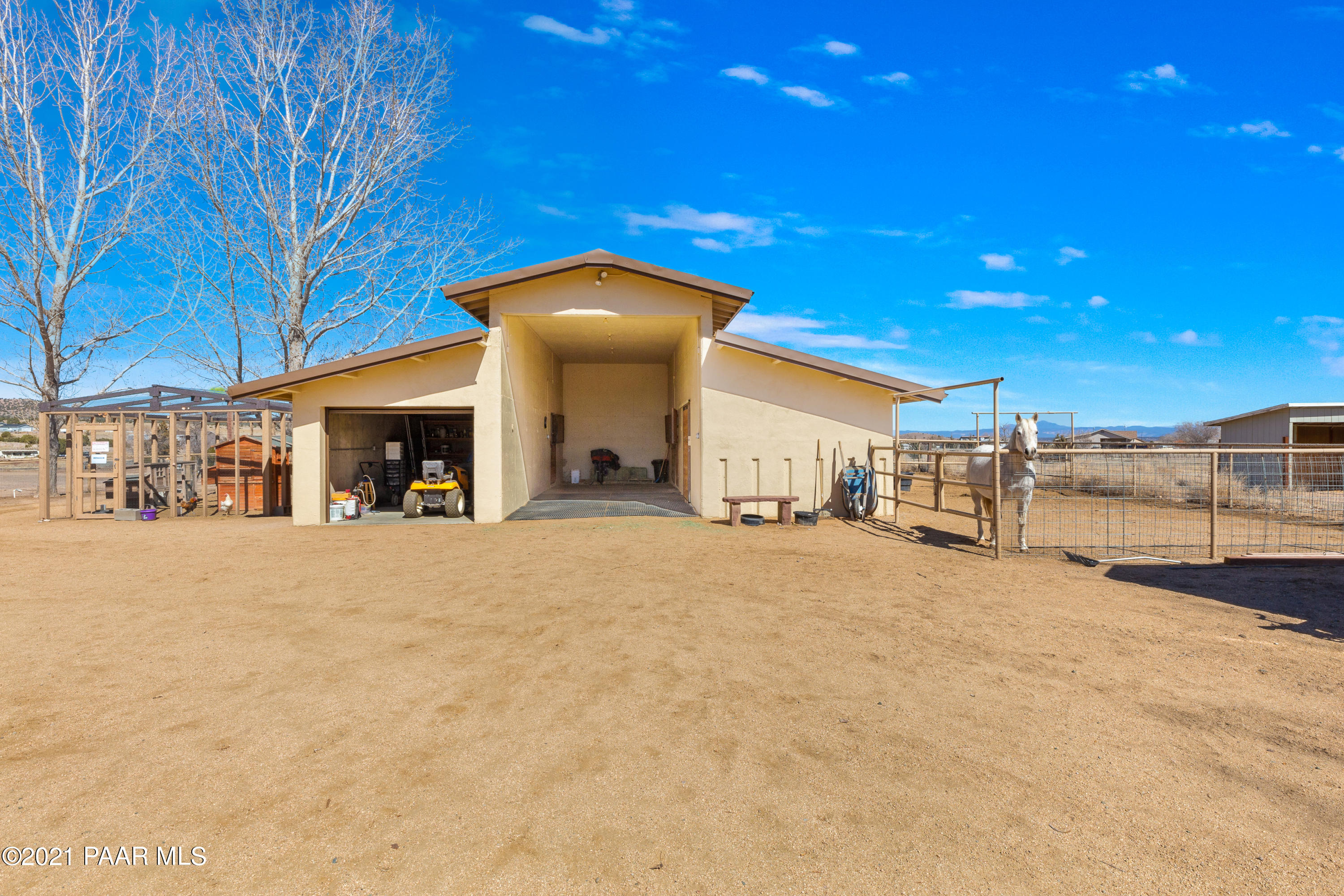 3727 North Reed Road Chino Valley, AZ 86323 - Photo 27 of 45 a view of a house with a yard