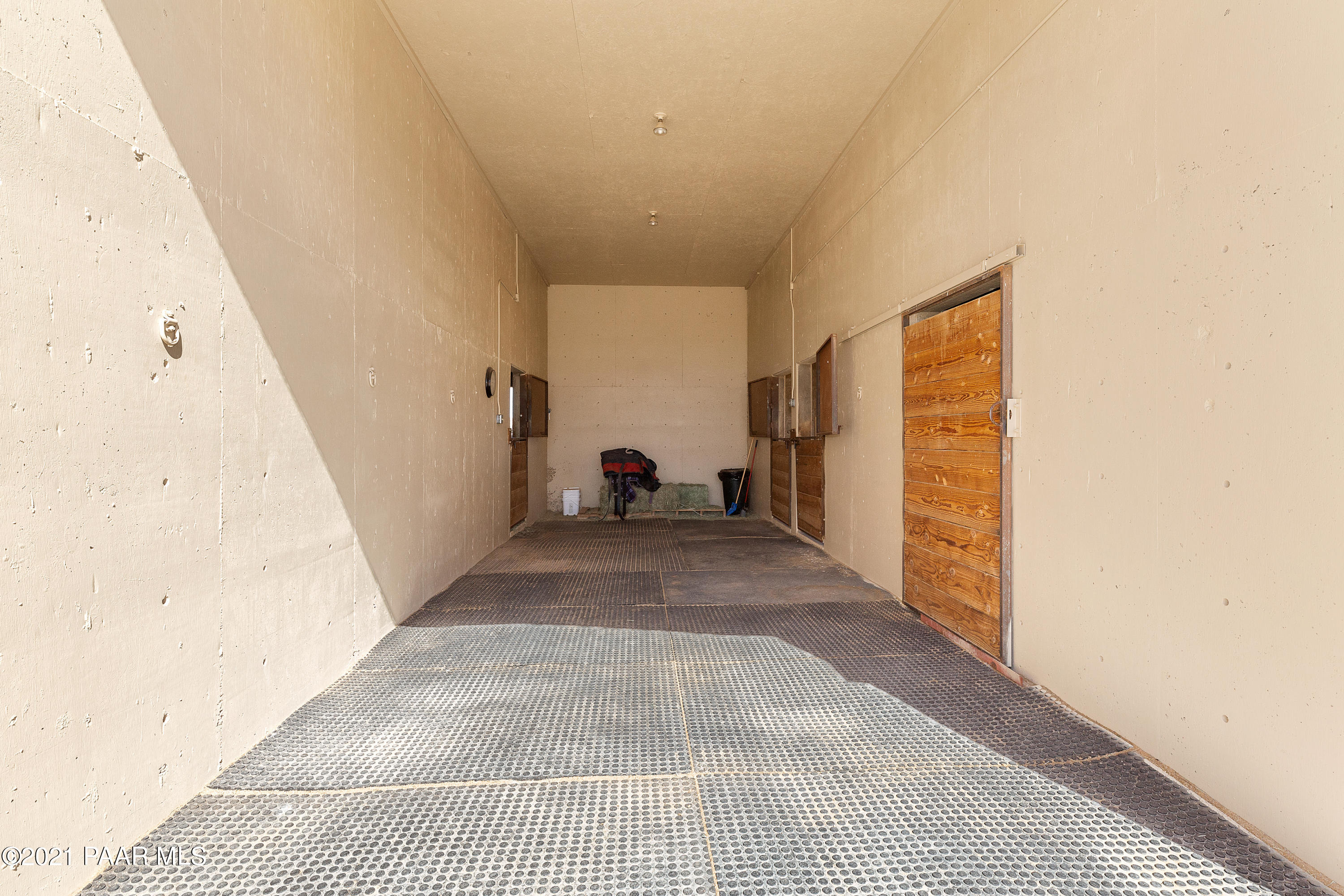 3727 North Reed Road Chino Valley, AZ 86323 - Photo 28 of 45 a view of a hallway with white walls and white walls