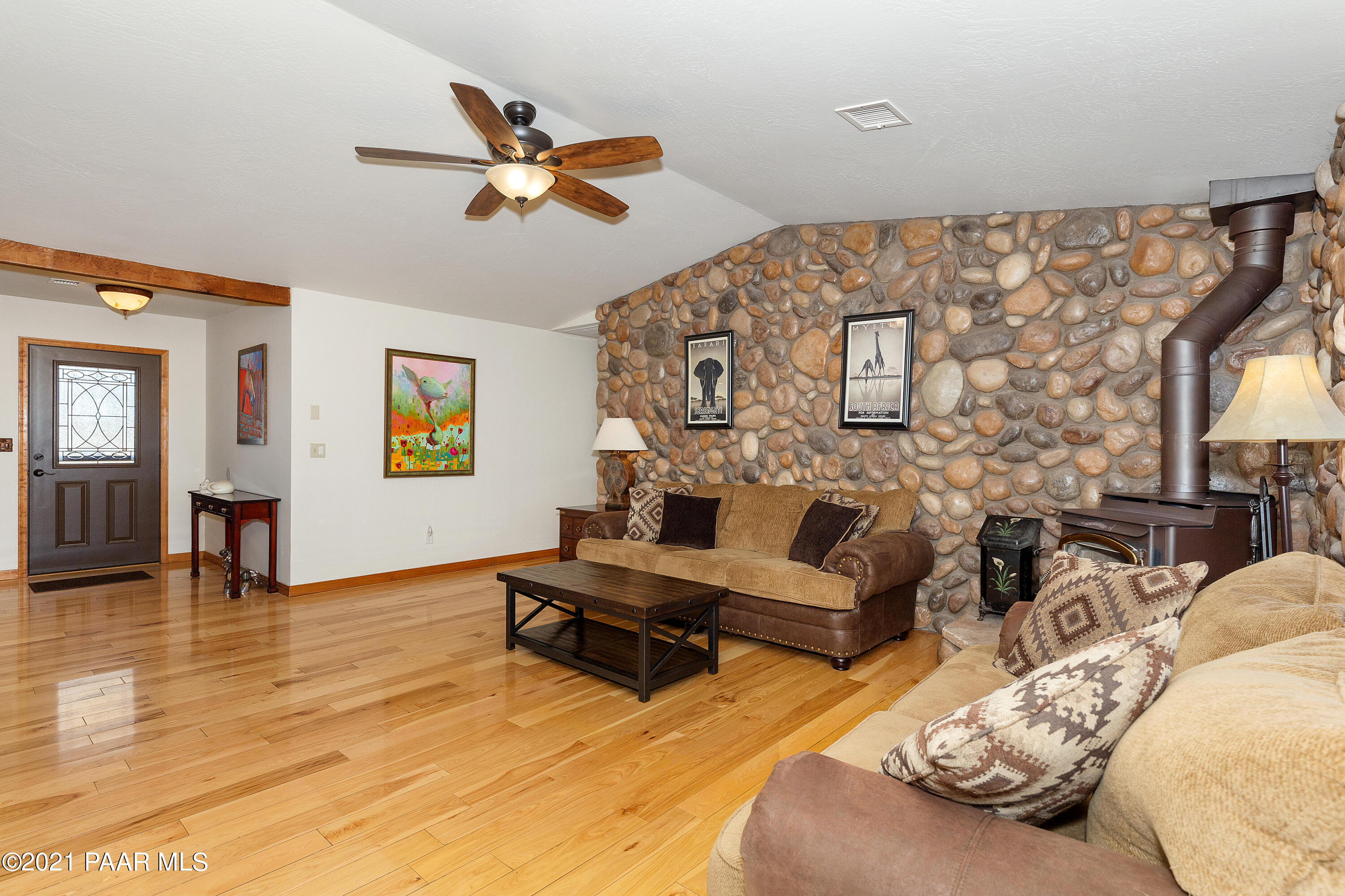 3727 North Reed Road Chino Valley, AZ 86323 - Photo 4 of 45 a living room with furniture and a wooden floor