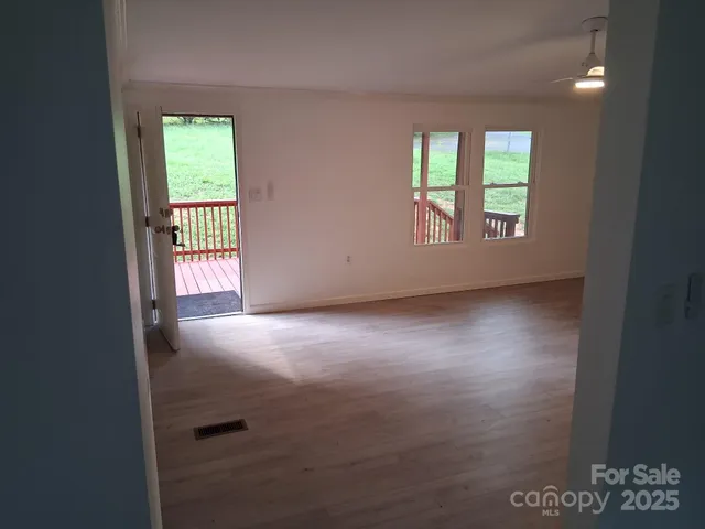 an empty room with windows