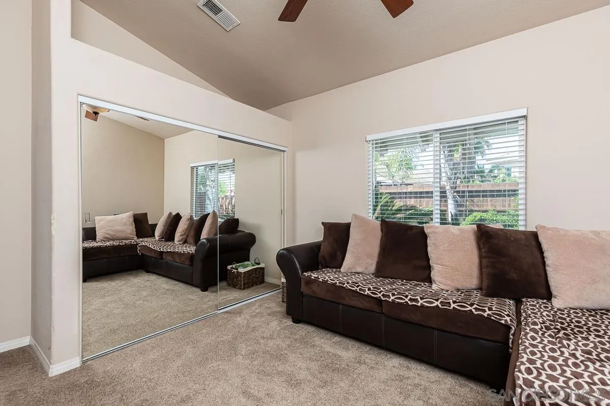 8538 Paseo De Los Castillos Santee, CA 92071 - Photo 13 of 20 a living room with furniture and a couch