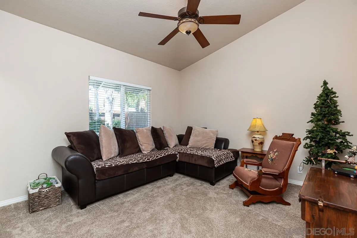 8538 Paseo De Los Castillos Santee, CA 92071 - Photo 14 of 20 a living room with furniture and a window