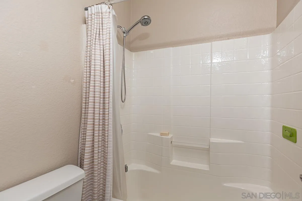 8538 Paseo De Los Castillos Santee, CA 92071 - Photo 16 of 20 a bathroom with a shower