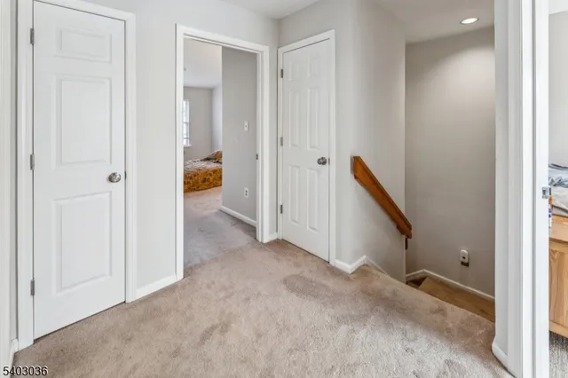 a view of a house with brick walls