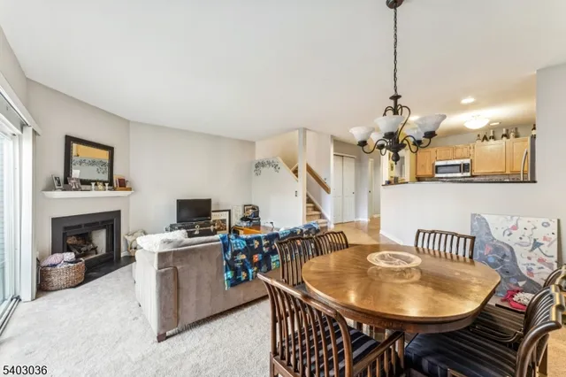 a very nice looking dining room with a table and chairs