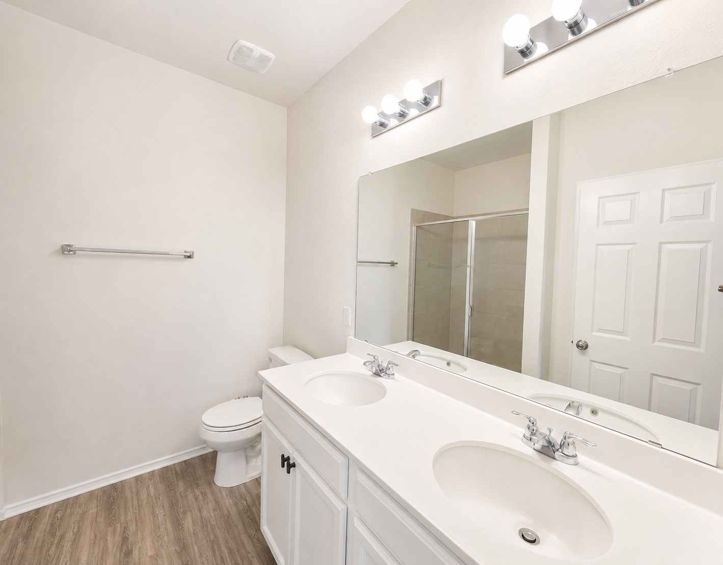 220 Pepperbark Loop Buda, TX 78610 - Photo 16 of 27 Double Vanity and Walk-in Shower