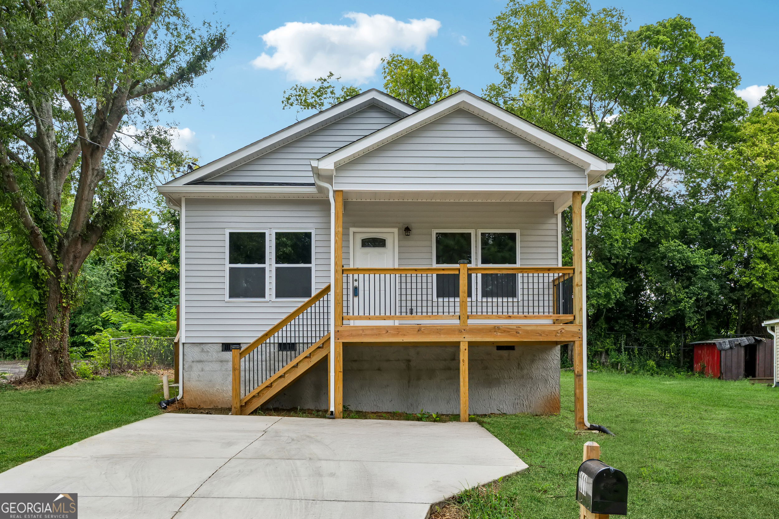 111 Hosea Street Rome, GA 30161 - Photo 2 of 14 a view of house with backyard and garden