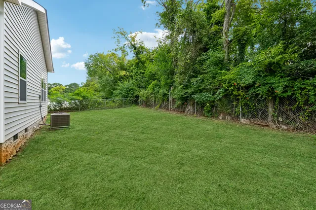 a view of a garden with a tree