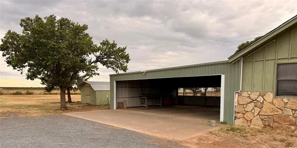 a front view of a house with patio