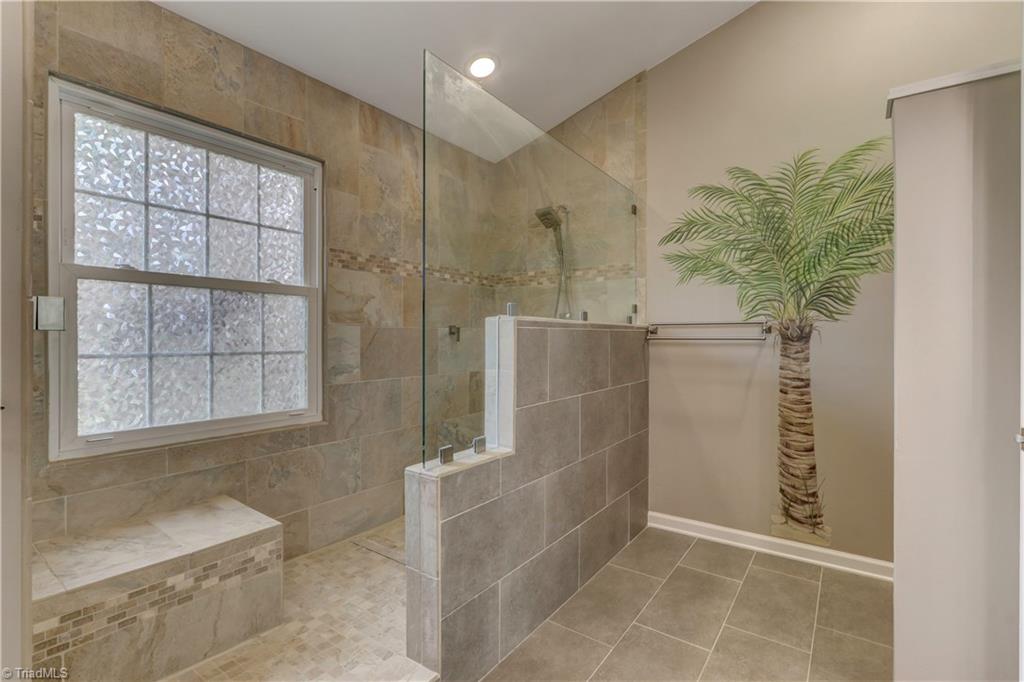 3603 Chance Road Greensboro, NC 27410 - Photo 20 of 30 Oversized walk-in tiled shower that will make you just melt.