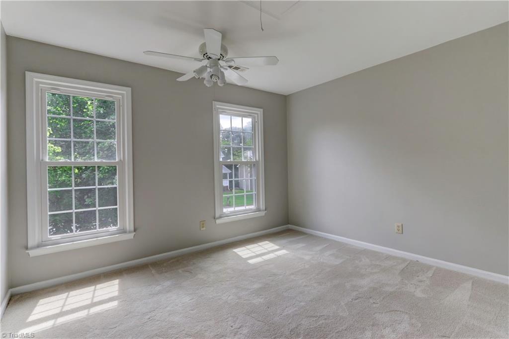 3603 Chance Road Greensboro, NC 27410 - Photo 21 of 30 One of three additional bedrooms on the second level.