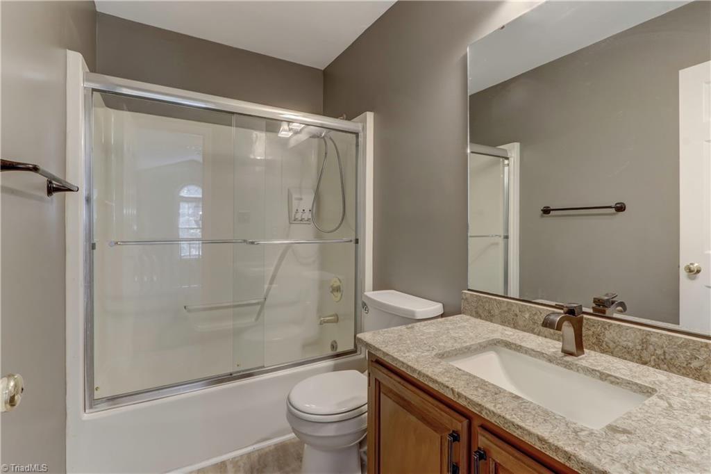 3603 Chance Road Greensboro, NC 27410 - Photo 23 of 30 Updated bath with granite countertops and combo tub-shower.