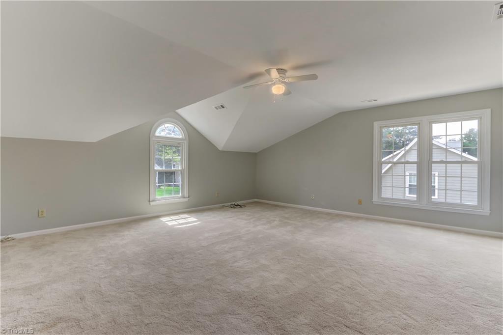 3603 Chance Road Greensboro, NC 27410 - Photo 24 of 30 This could be used as a fourth bedroom or as a bonus room. It does have a full bath attached.