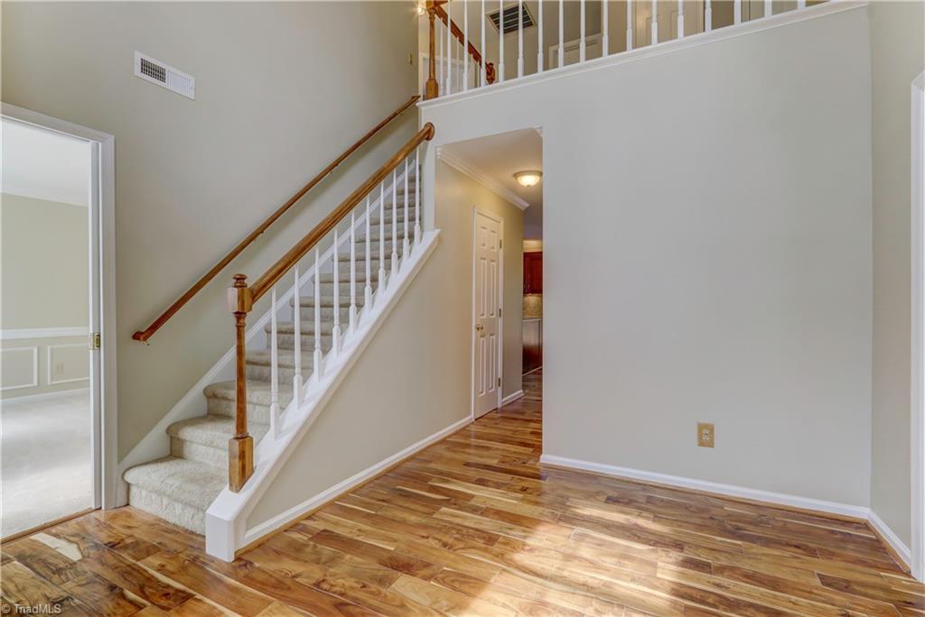 Beautiful Engineered Hardwood Floors and Tile highlight the lower level in all rooms except the dining.