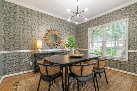 a kitchen with a refrigerator stove and microwave