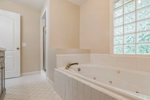 a view of a porch with wooden floor