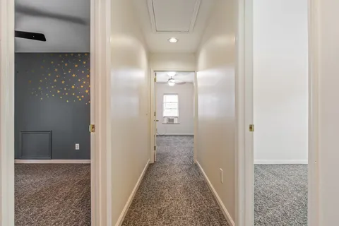 a backyard of a house with outdoor seating